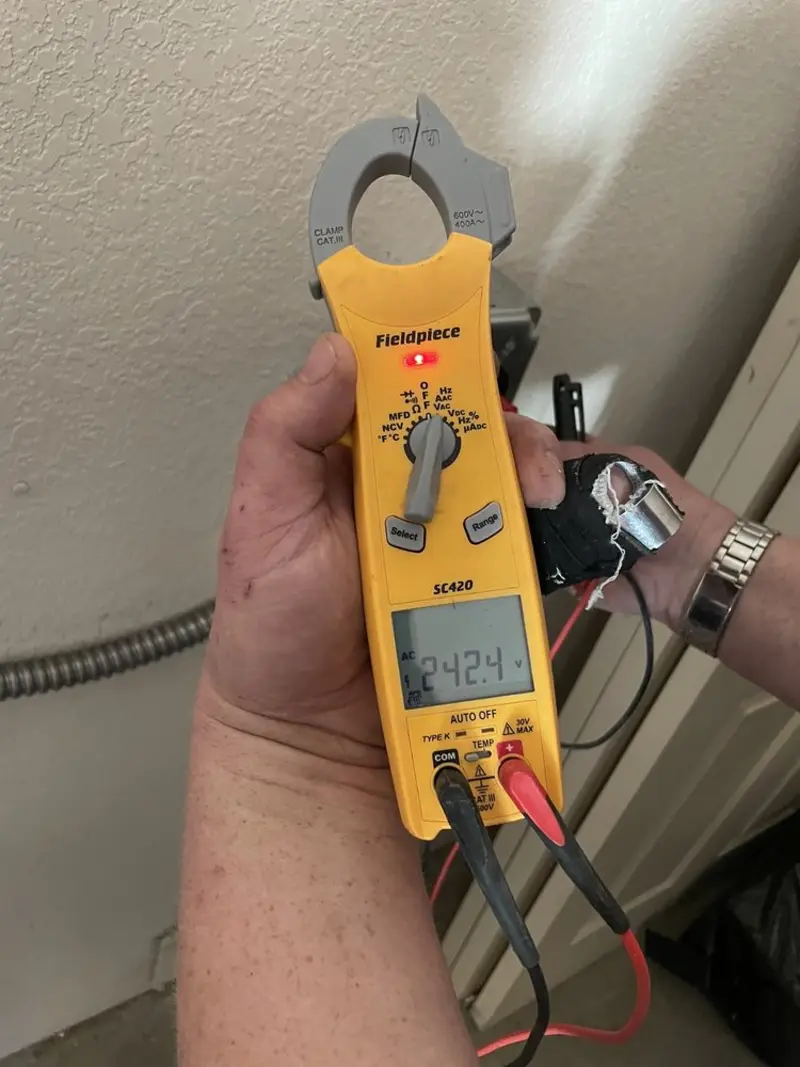 Voltage testing with clamp meter during Circuit Breaker Repair in North Baltimore
